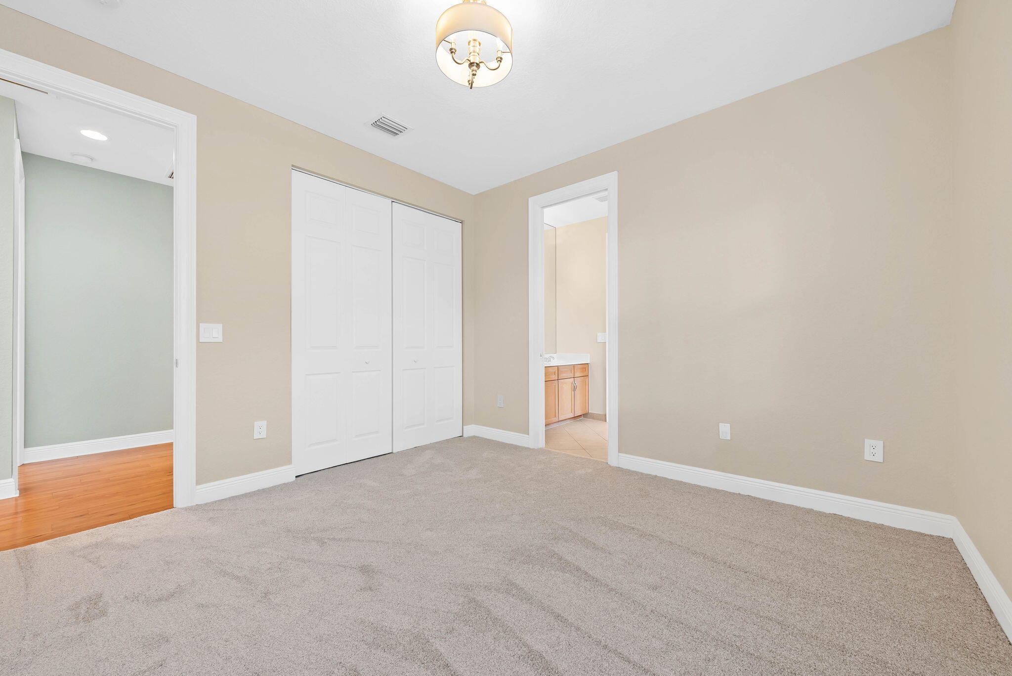10774 Sunset Ridge Circle Boynton Beach, FL 33473 - Photo 22 of 39 a view of an empty room with a window