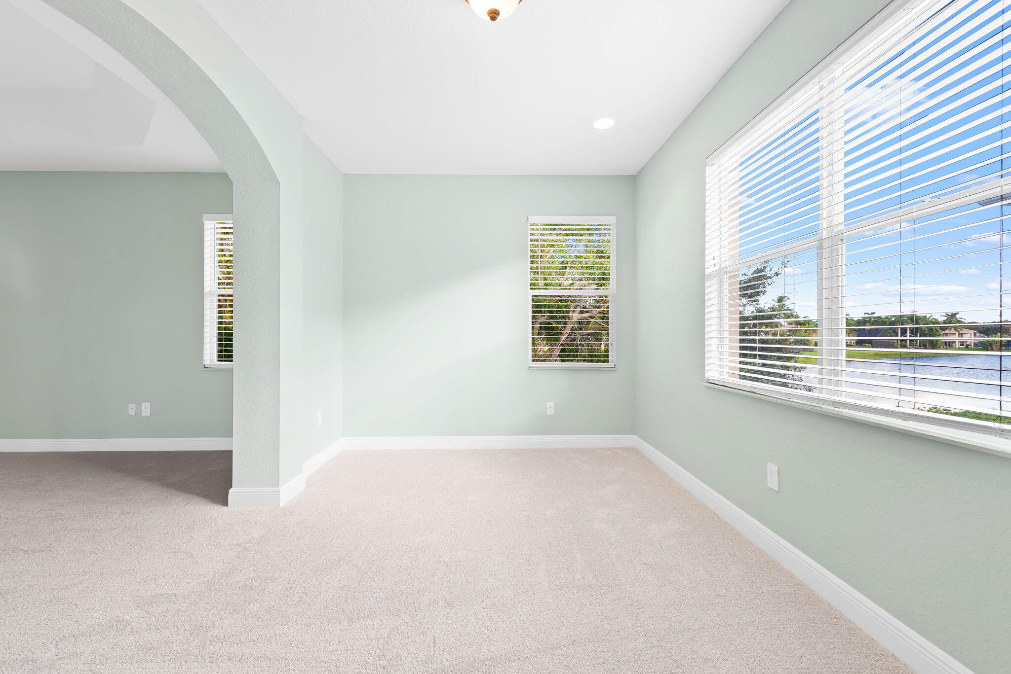 10774 Sunset Ridge Circle Boynton Beach, FL 33473 - Photo 31 of 39 an empty room with windows