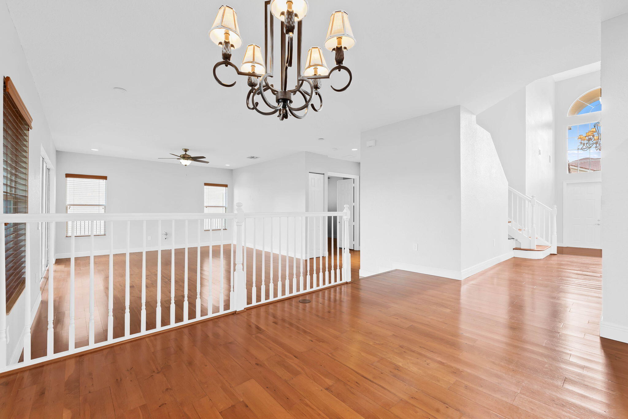 10774 Sunset Ridge Circle Boynton Beach, FL 33473 - Photo 10 of 39 a view of a livingroom with wooden floor