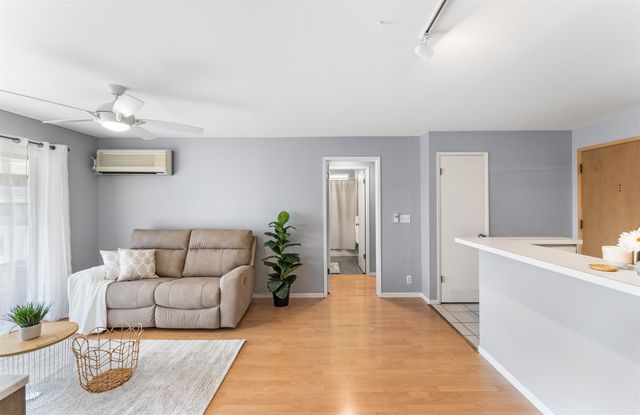 a living room with furniture and a couch
