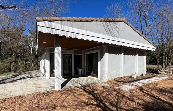 a view of a house with a patio