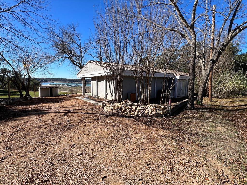 17313 West Beach Road Austin, TX 78734 - Photo 24 of 31 a view of a yard in front of house