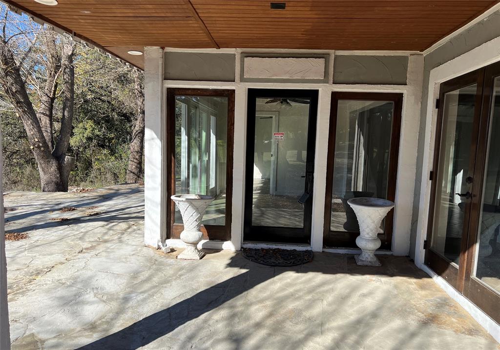 17313 West Beach Road Austin, TX 78734 - Photo 7 of 31 a view of a house with a outdoor space