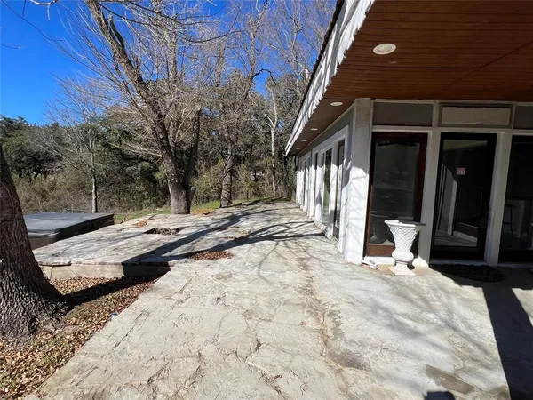 a view of a house with a snow in the yard