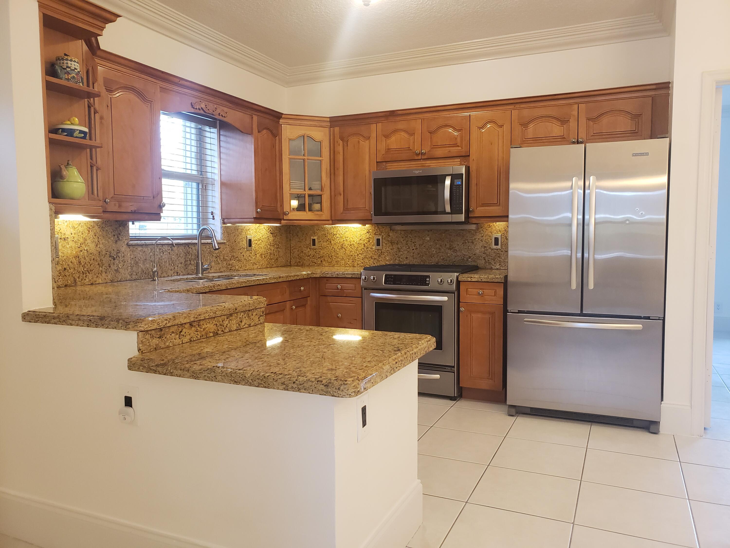 7260 Grapeview Boulevard Loxahatchee, FL 33470 - Photo 1 of 36 Kitchen