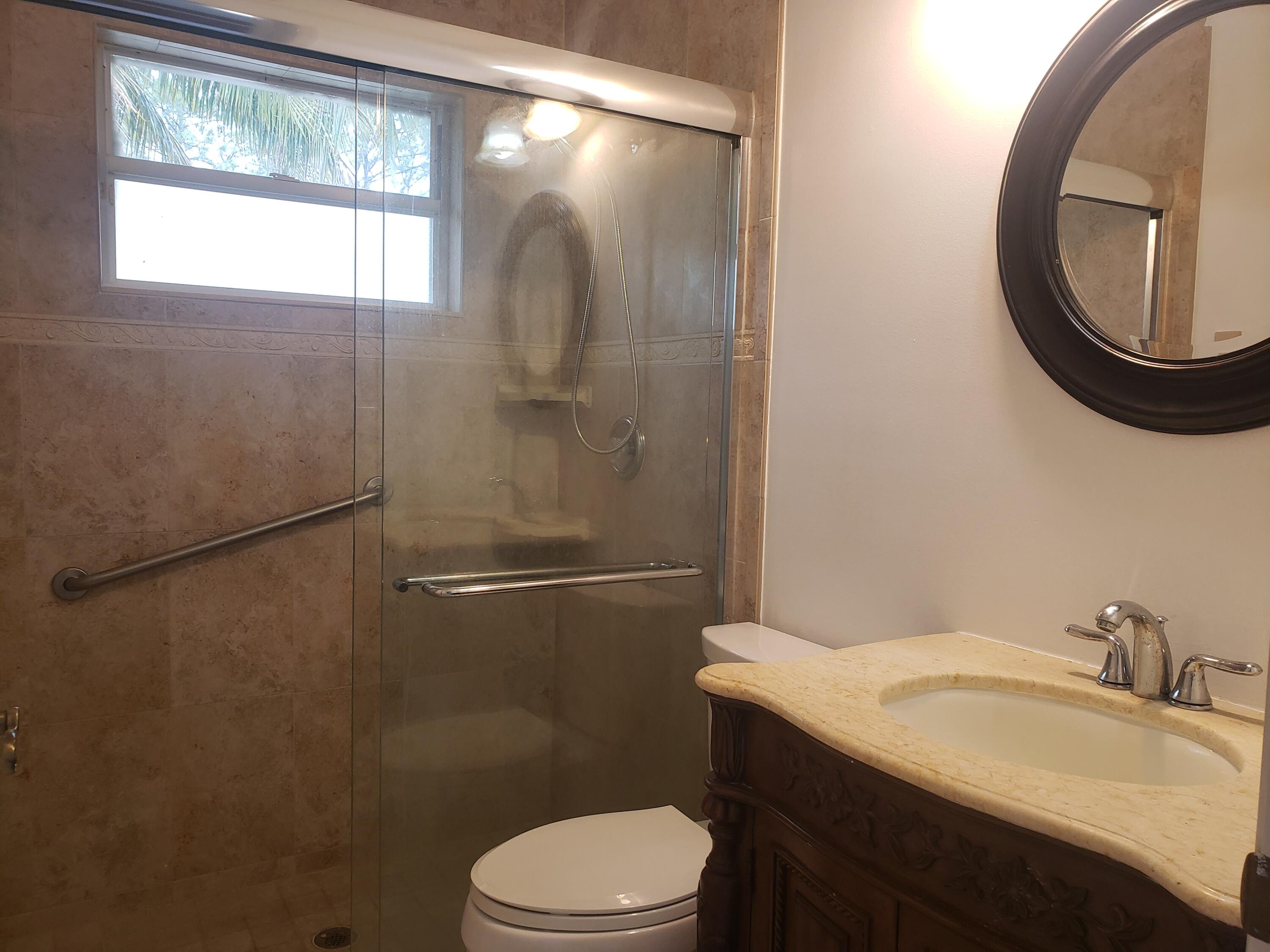7260 Grapeview Boulevard Loxahatchee, FL 33470 - Photo 13 of 36 Bathroom Vanity