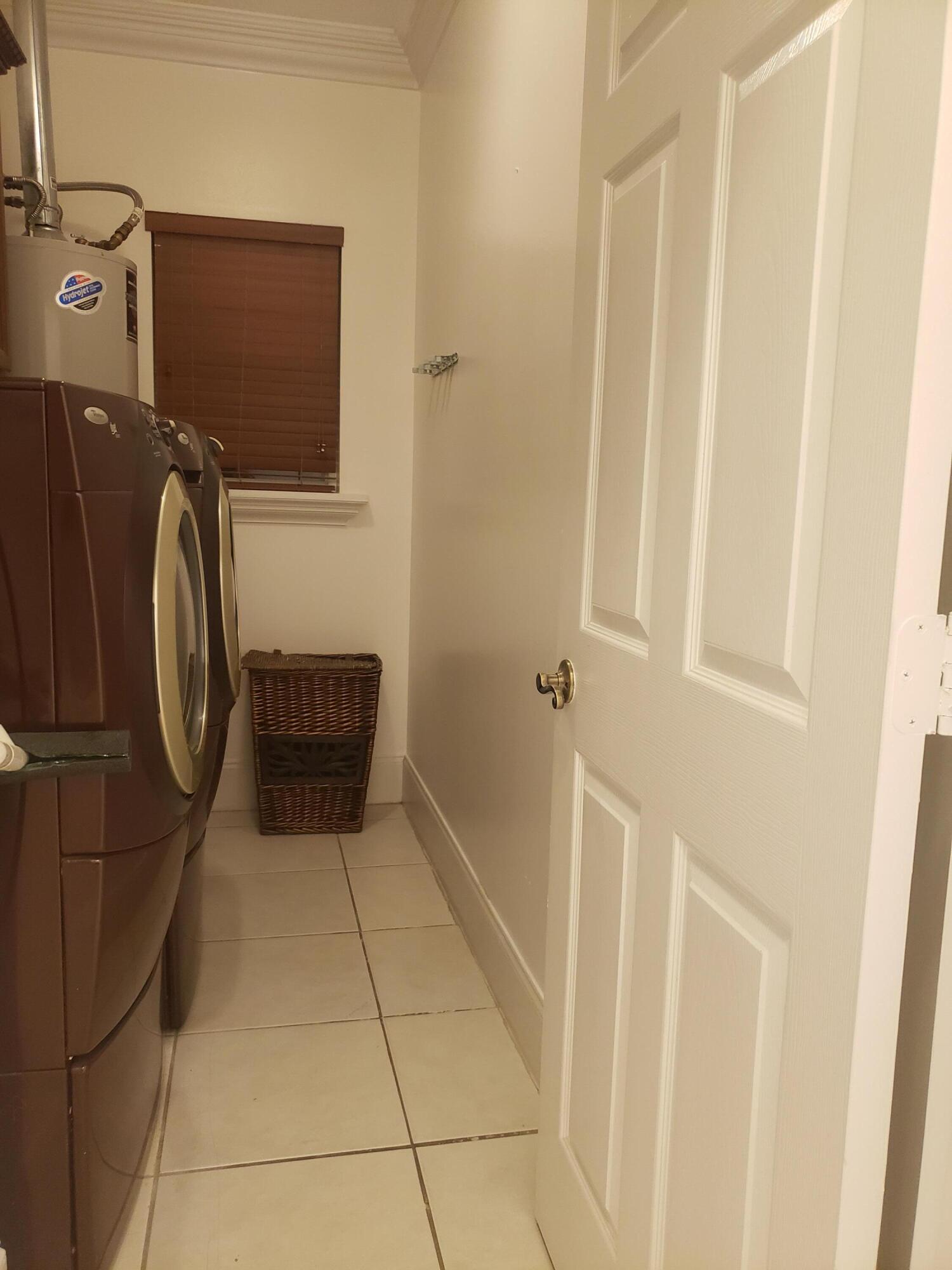 7260 Grapeview Boulevard Loxahatchee, FL 33470 - Photo 20 of 36 Utility Room