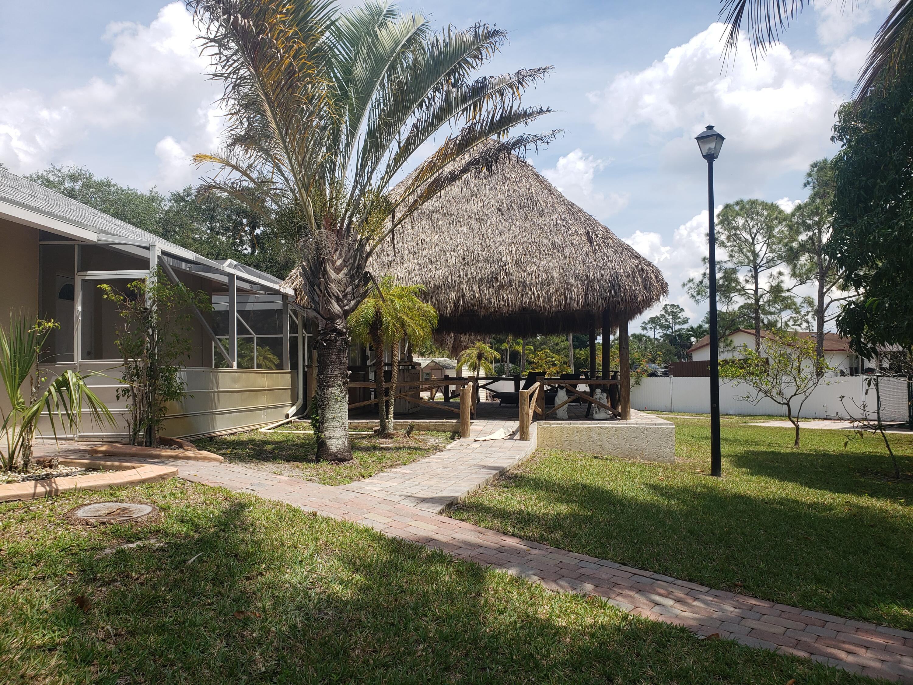 7260 Grapeview Boulevard Loxahatchee, FL 33470 - Photo 21 of 36 Tiki Hut