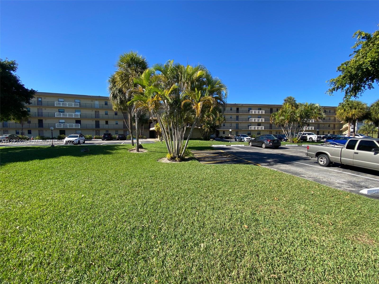 9355 Southwest 8th Street, Unit 216 Boca Raton, FL 33428 - Photo 15 of 15 a view of a park with houses