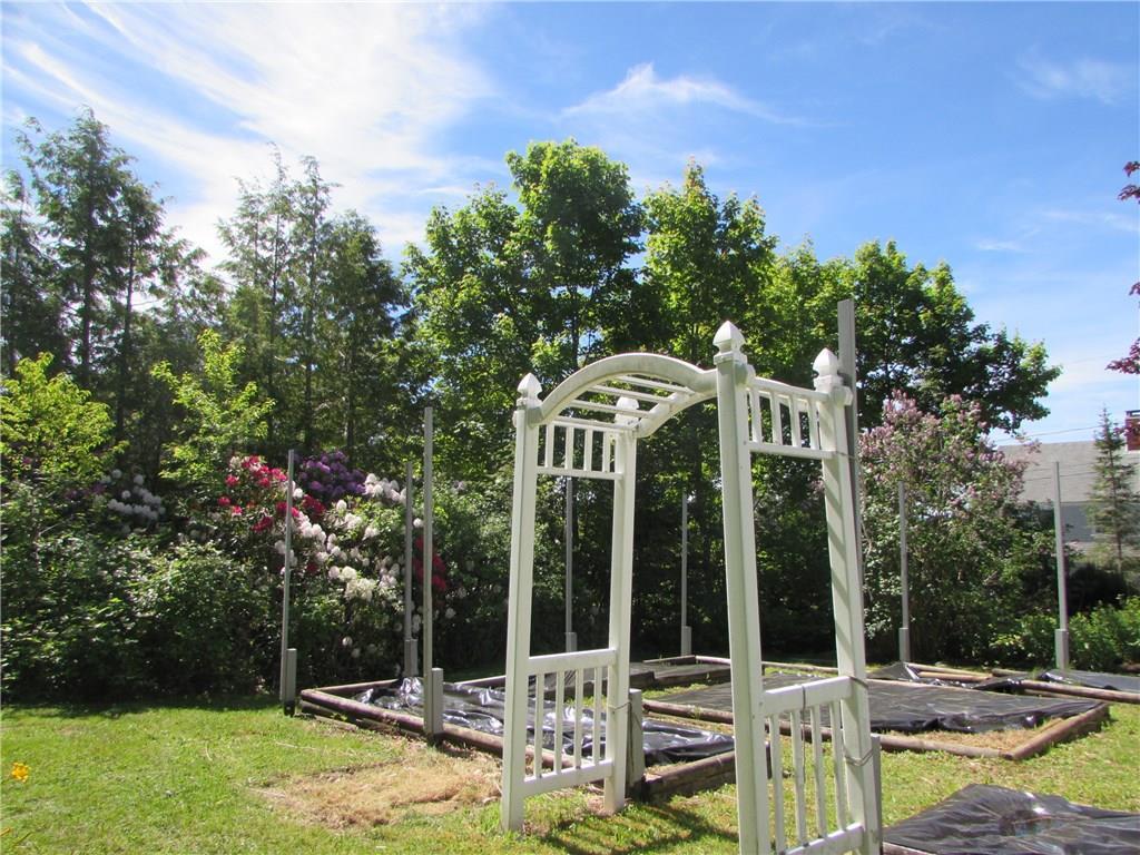 29 Madockawando Road Castine, ME 04421 - Photo 3 of 30 Raised bed gardens and mature plantings