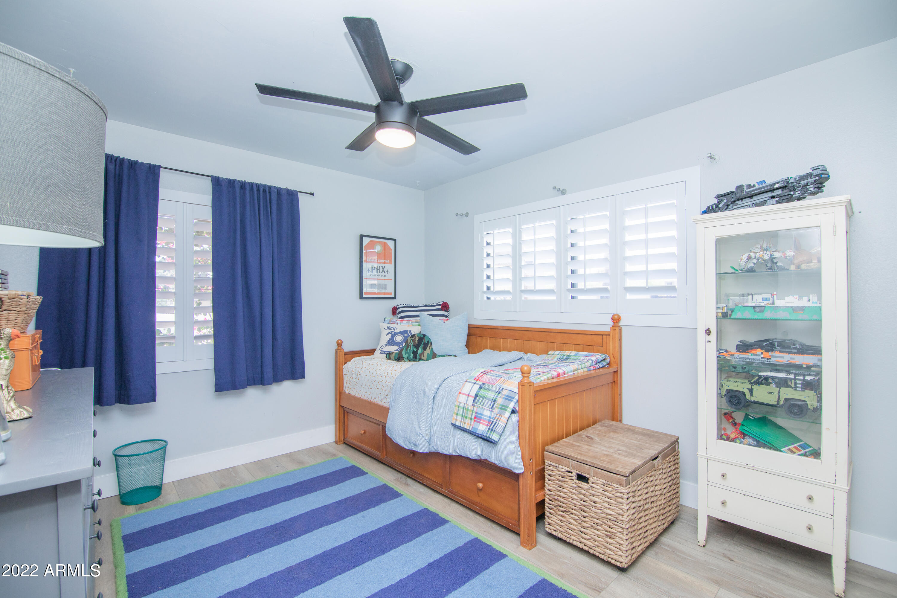 11044 North 36th Street Phoenix, AZ 85028 - Photo 31 of 49 a bedroom with bed and window