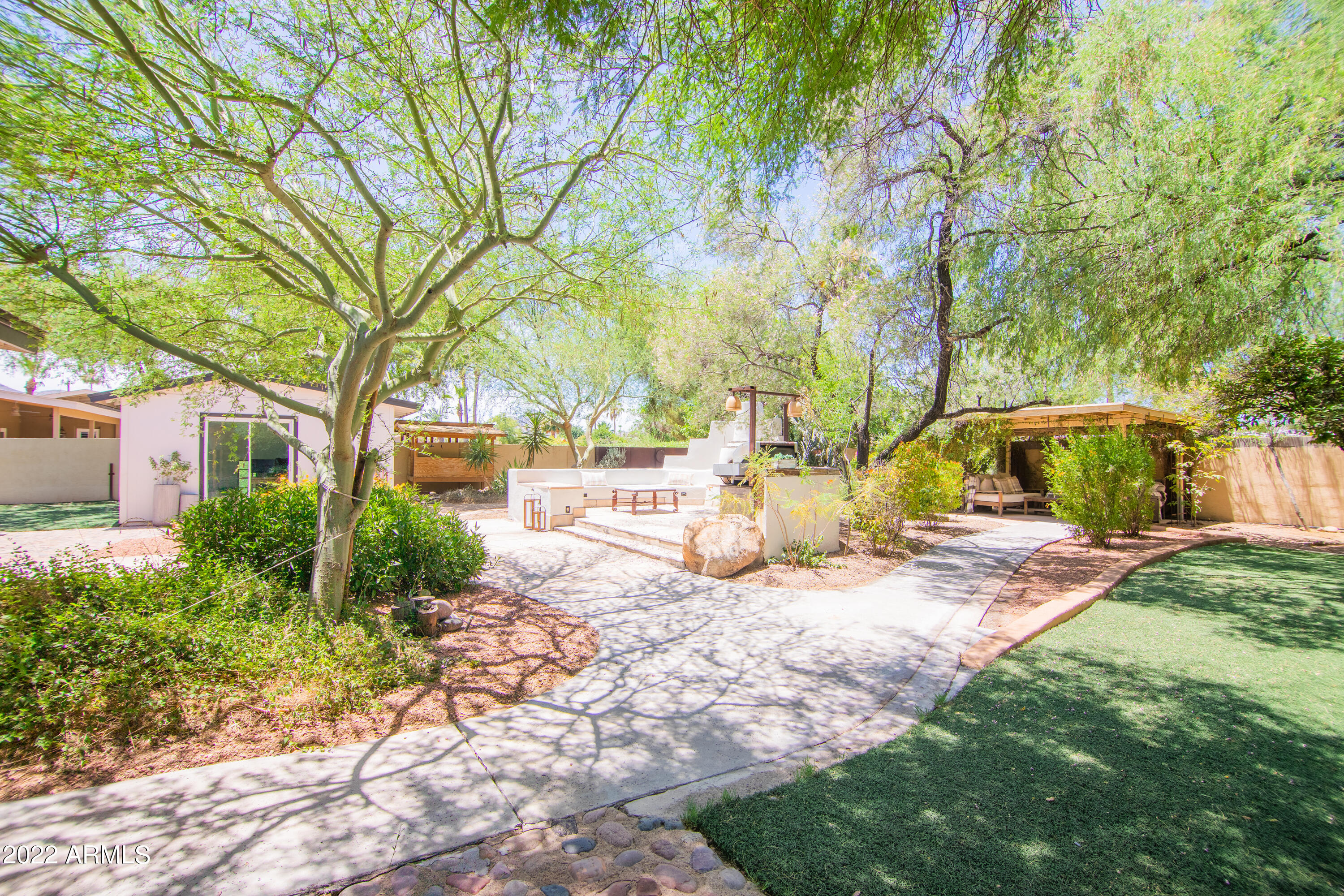 11044 North 36th Street Phoenix, AZ 85028 - Photo 37 of 49 a view of a yard with a tree