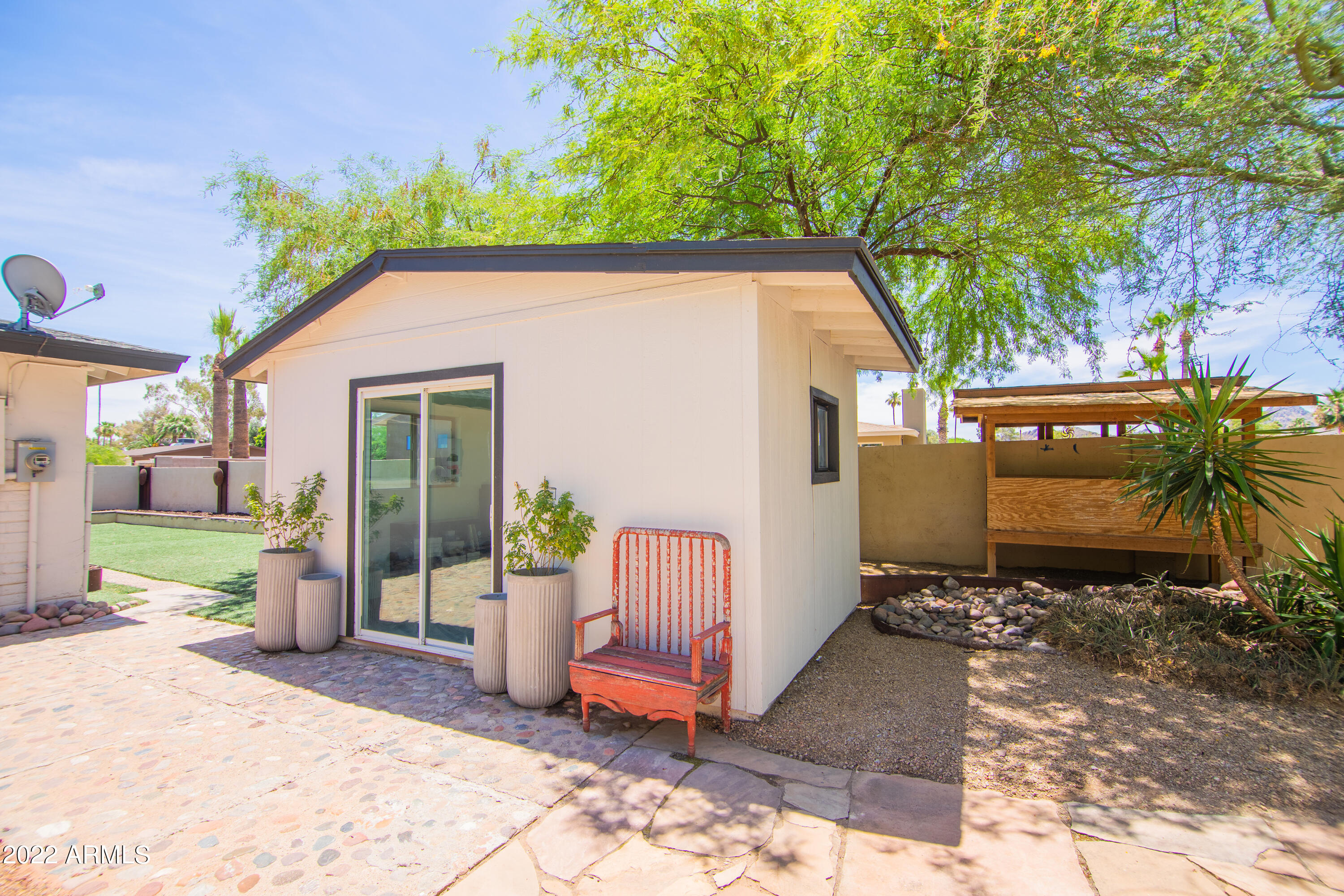 11044 North 36th Street Phoenix, AZ 85028 - Photo 43 of 49 a view of backyard with barbeque grill and plants