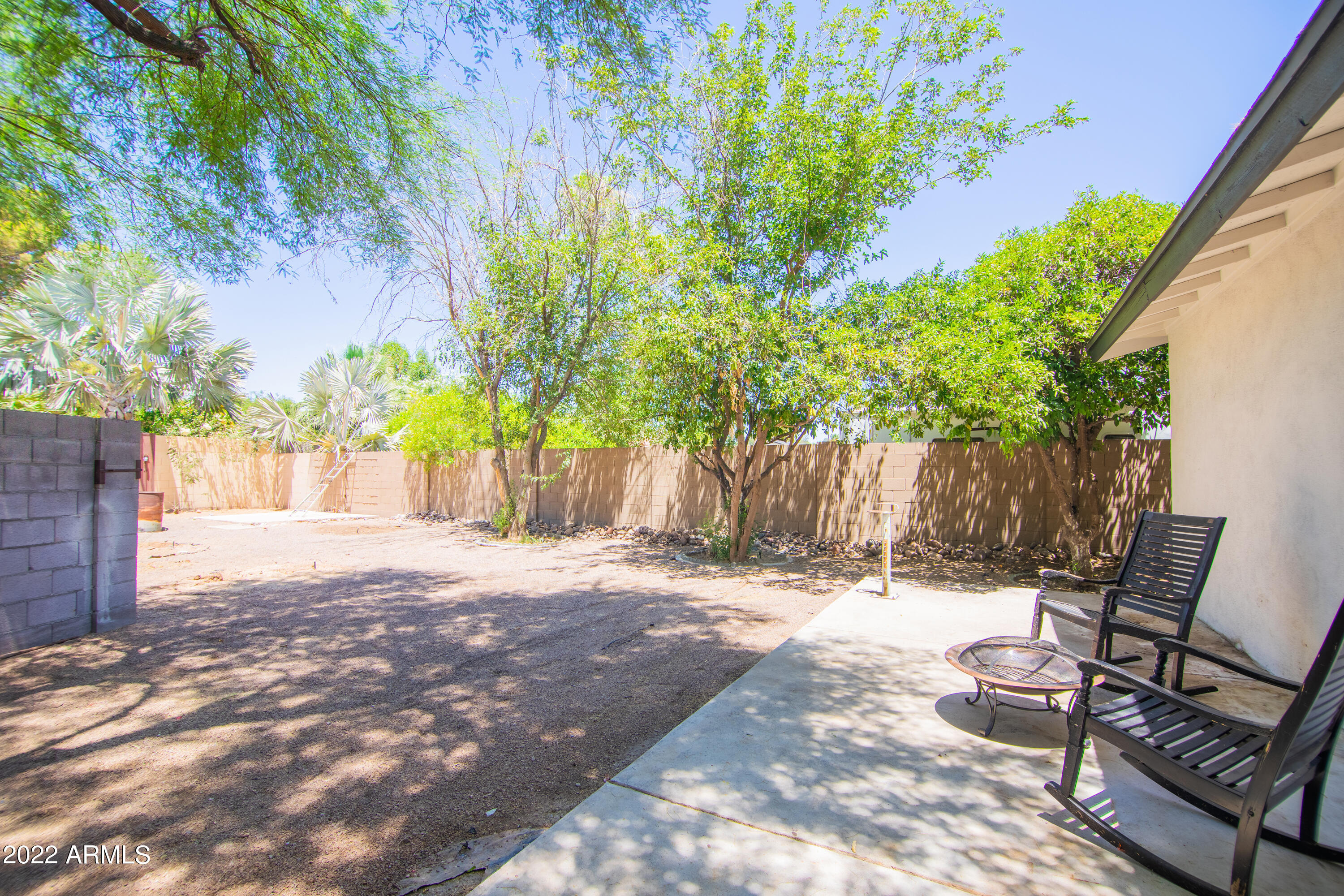 11044 North 36th Street Phoenix, AZ 85028 - Photo 47 of 49 a view of a backyard with chairs