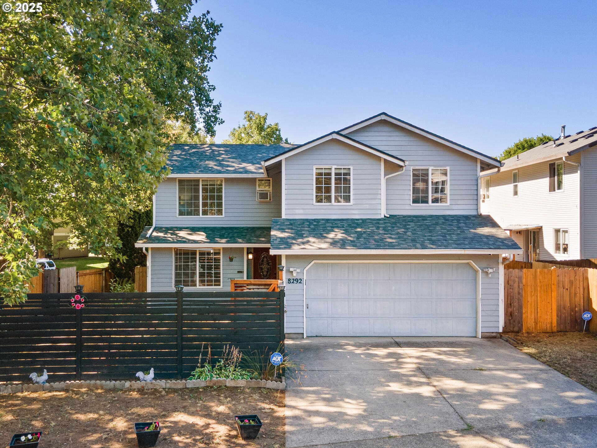 a front view of a house with a garage