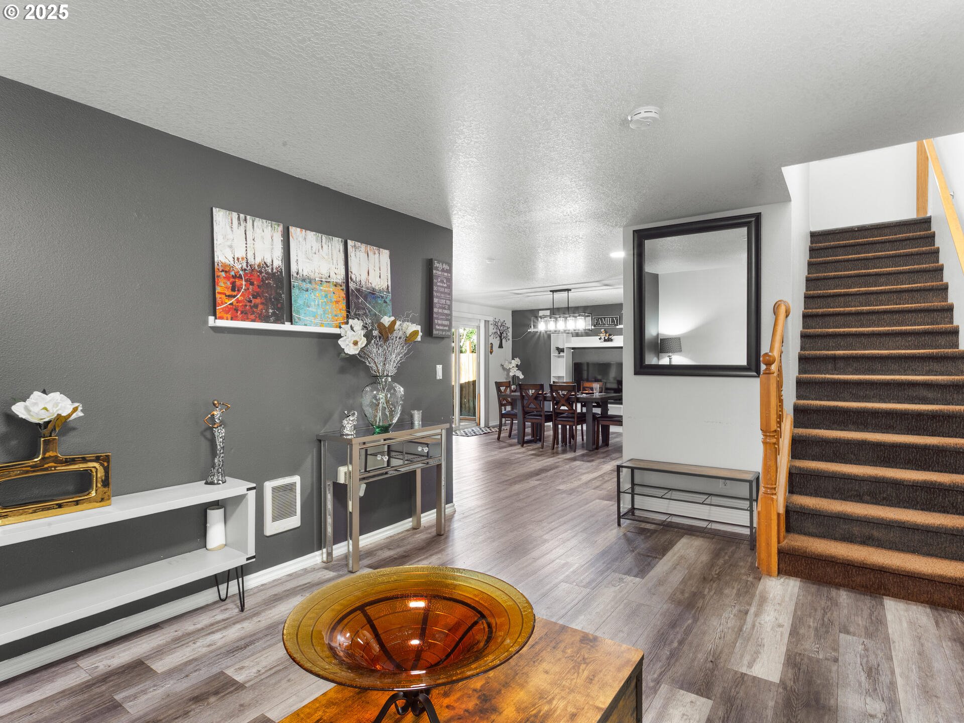 8292 Northeast Snowberry Loop Vancouver, WA 98664 - Photo 13 of 48 a living room with furniture and wooden floor