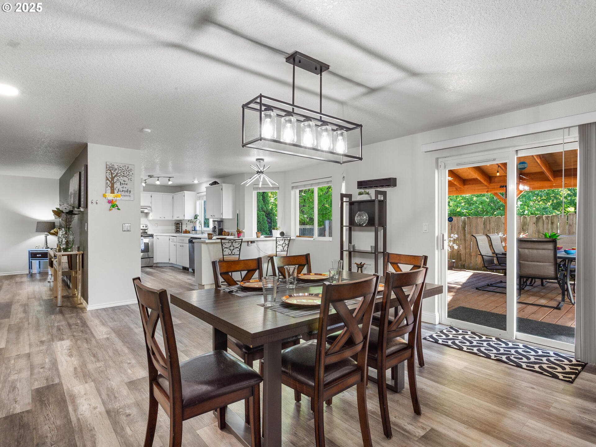 8292 Northeast Snowberry Loop Vancouver, WA 98664 - Photo 17 of 48 a view of a dining room with furniture window and outside view