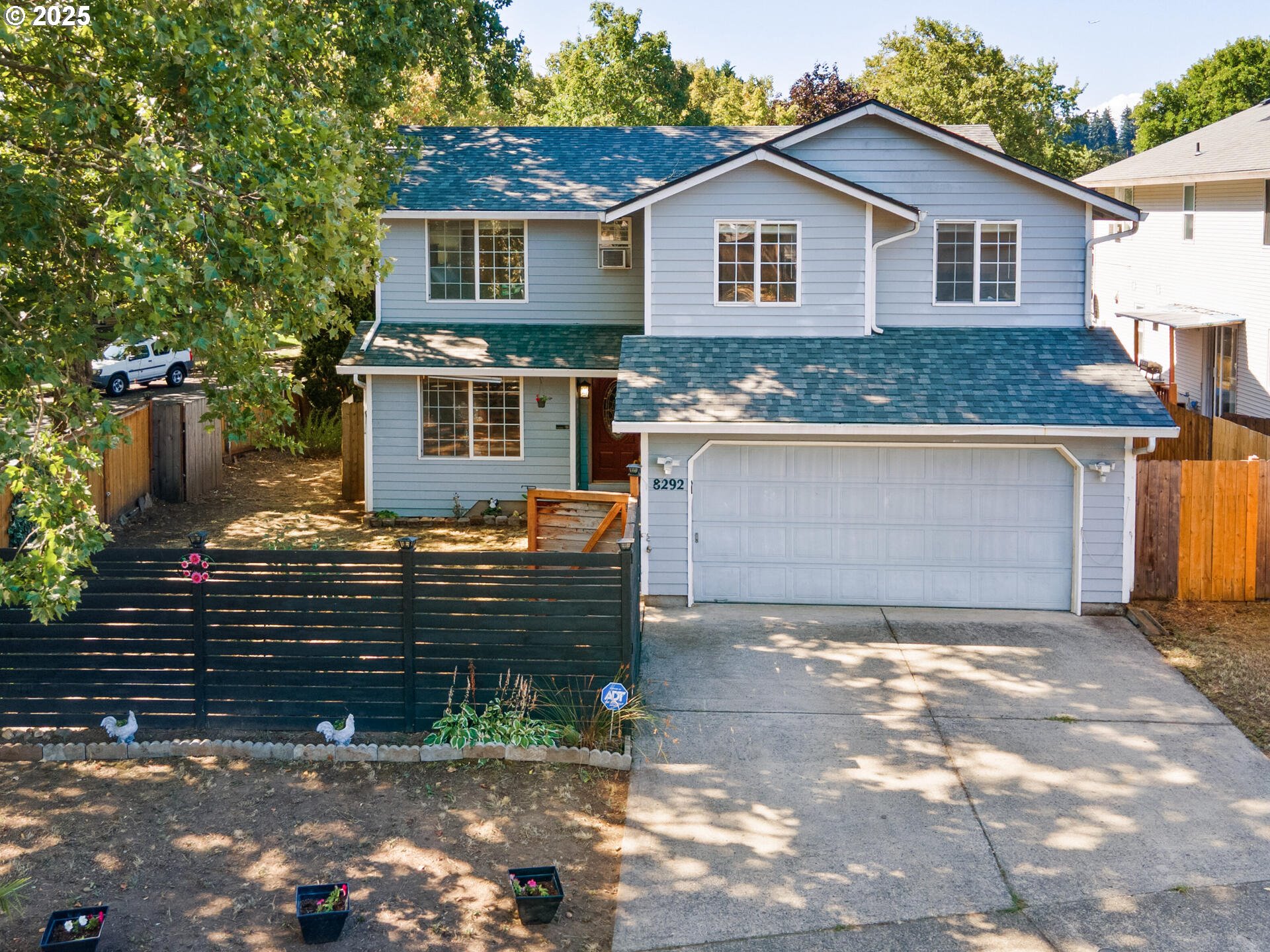 8292 Northeast Snowberry Loop Vancouver, WA 98664 - Photo 2 of 48 a front view of a house with a yard