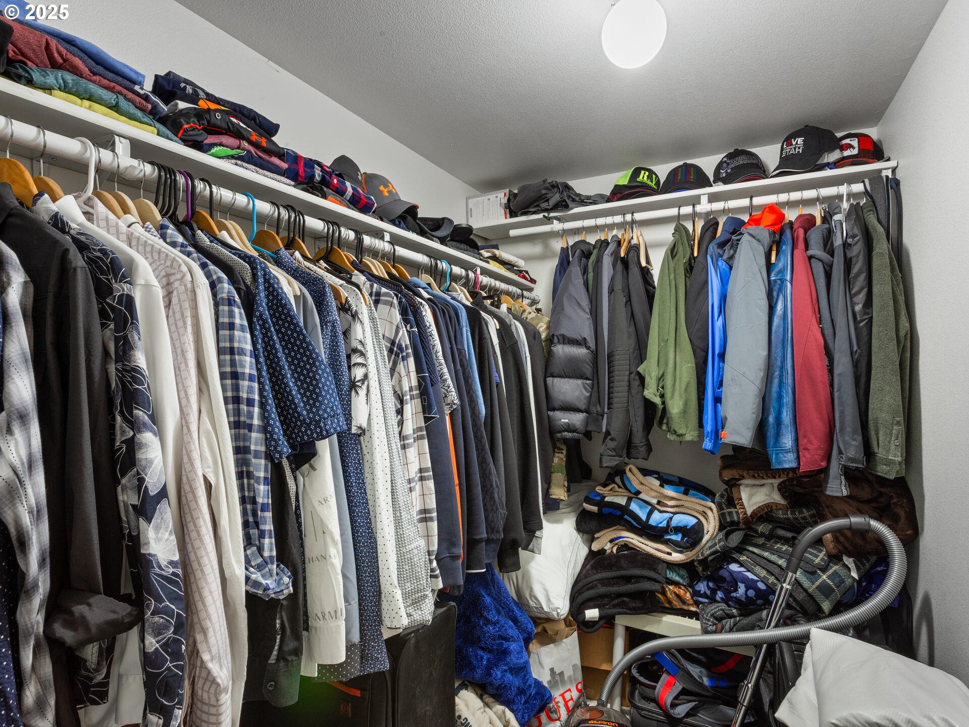 8292 Northeast Snowberry Loop Vancouver, WA 98664 - Photo 32 of 48 a view of walk in closet with clothes and shoes