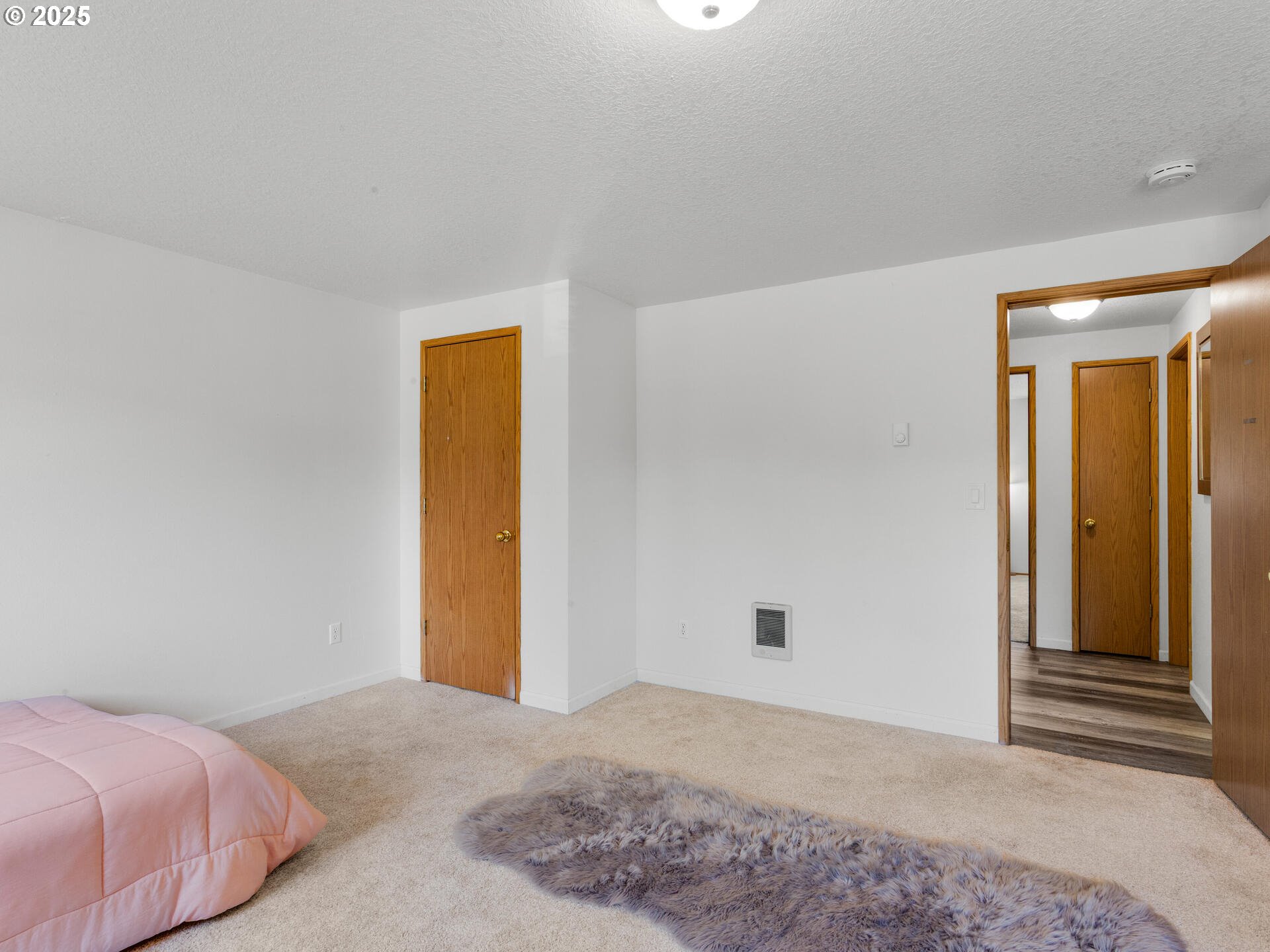 8292 Northeast Snowberry Loop Vancouver, WA 98664 - Photo 35 of 48 a bedroom with a bed and a window
