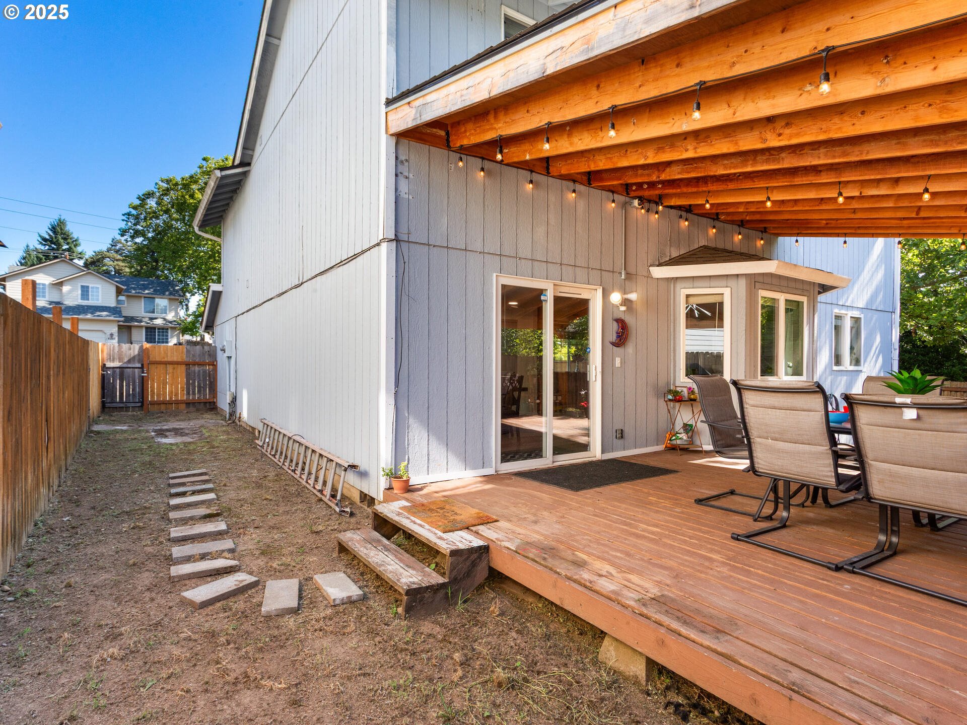 8292 Northeast Snowberry Loop Vancouver, WA 98664 - Photo 43 of 48 a backyard of a house with seating space