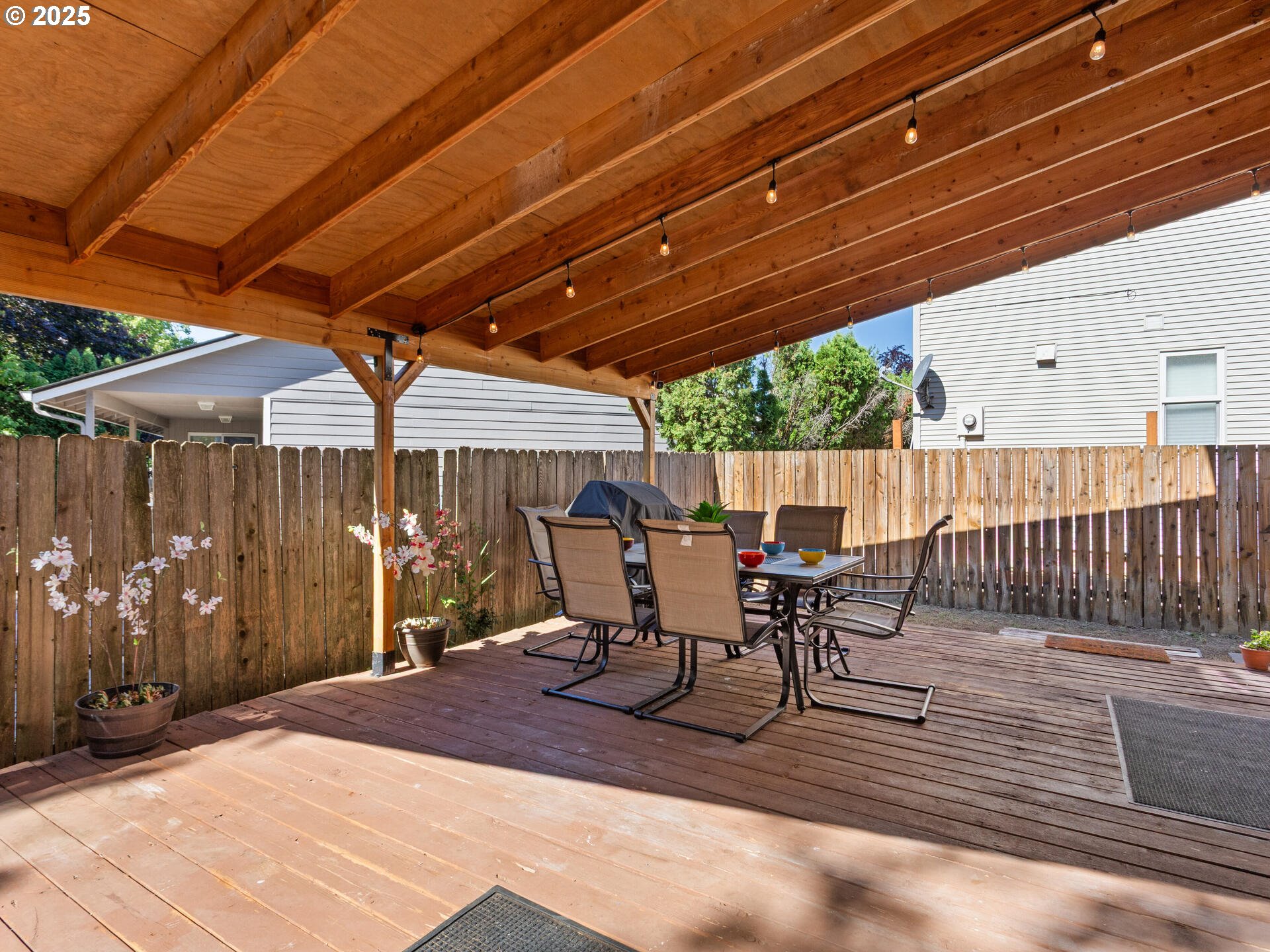 8292 Northeast Snowberry Loop Vancouver, WA 98664 - Photo 45 of 48 a patio with glass top table and chairs
