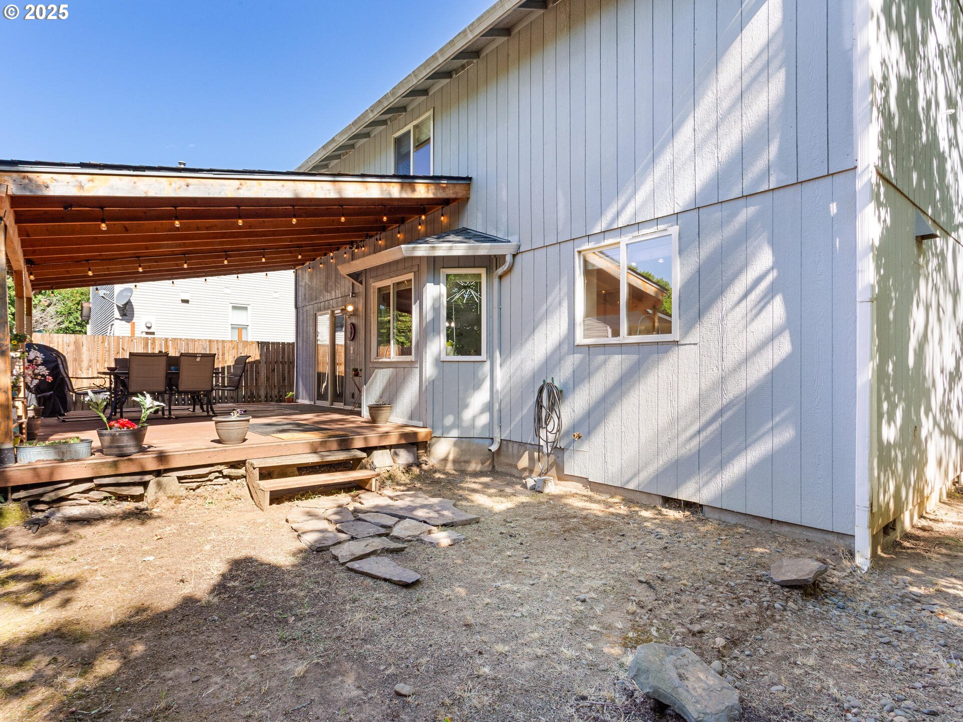 8292 Northeast Snowberry Loop Vancouver, WA 98664 - Photo 46 of 48 a view of a backyard with sitting area