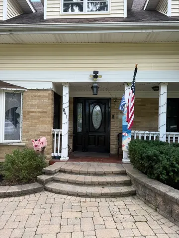 a front view of a house with entryway