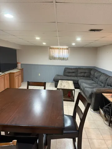 a view of a dining room with furniture