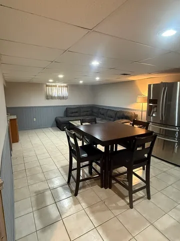 a view of a car park in front of house