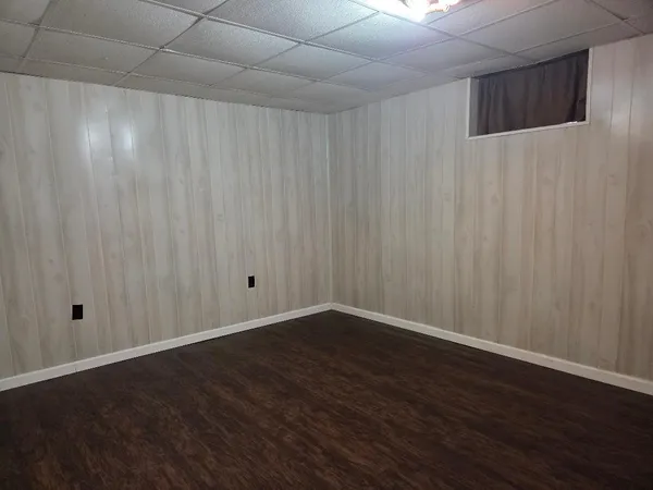 a view of a livingroom with wooden floor