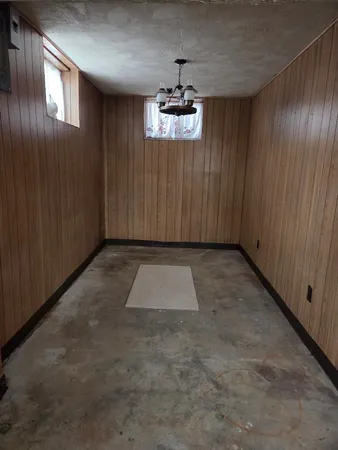 a room with water heater and storage
