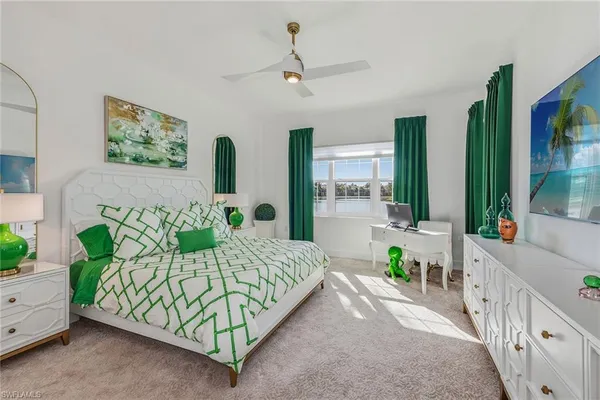 a bedroom with bed and a window