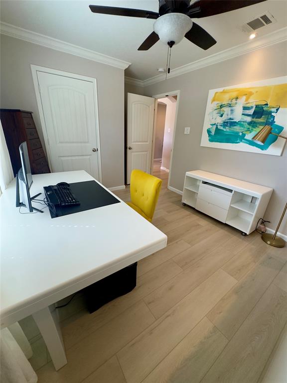 1508 Wild Rye Circle Princeton, TX 75407 - Photo 11 of 17 Office space with light wood-type flooring, ornamental molding, and a ceiling fan