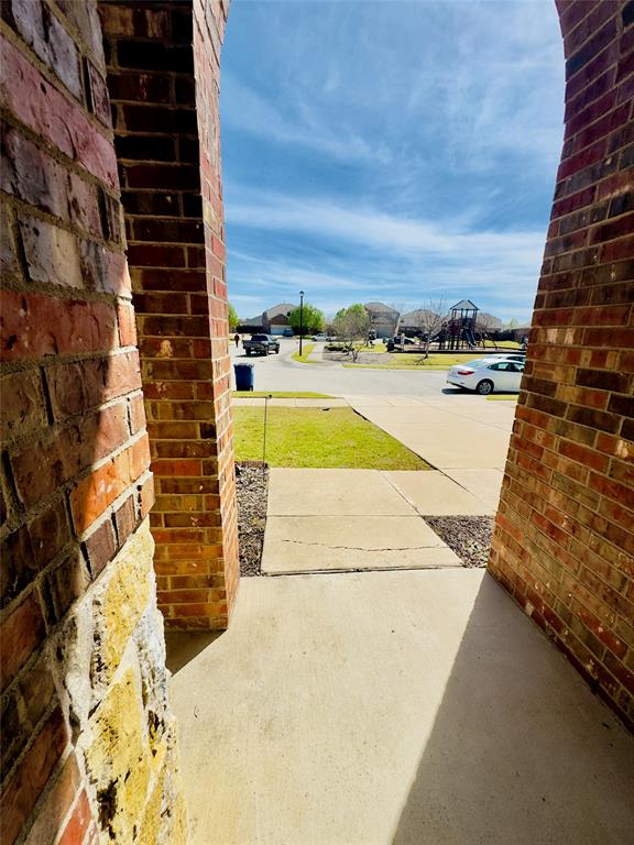 1508 Wild Rye Circle Princeton, TX 75407 - Photo 2 of 17 View of patio / terrace featuring a residential view