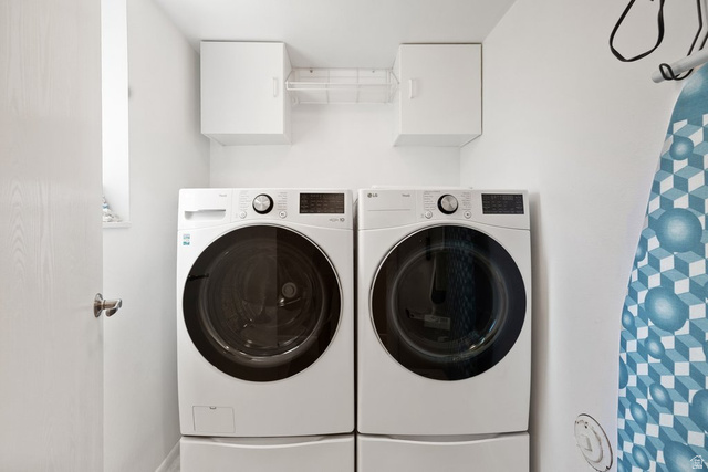 865 South 325 West Orem, UT 84058 - Photo 28 of 38 White front-loading washer and dryer set with pedestal bases