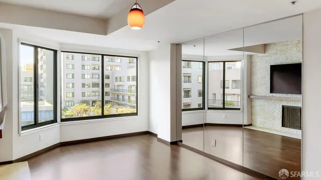 a view of an empty room and window
