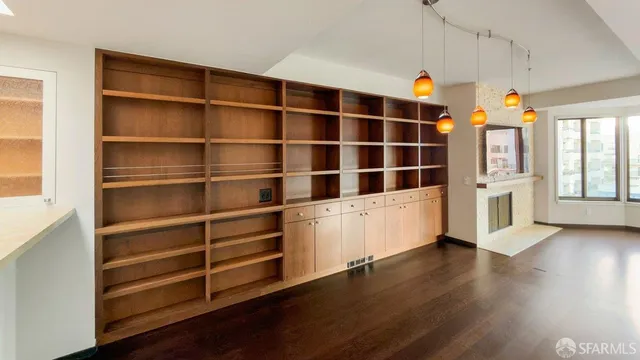 a view of a storage & utility room with wooden floor