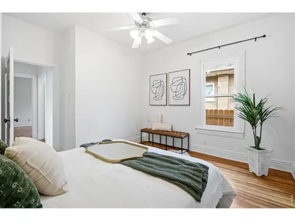 a bathroom with a sink vanity tub and a mirror