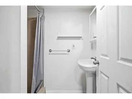 a storage room with washer and dryer