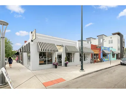 a front view of a building with street view
