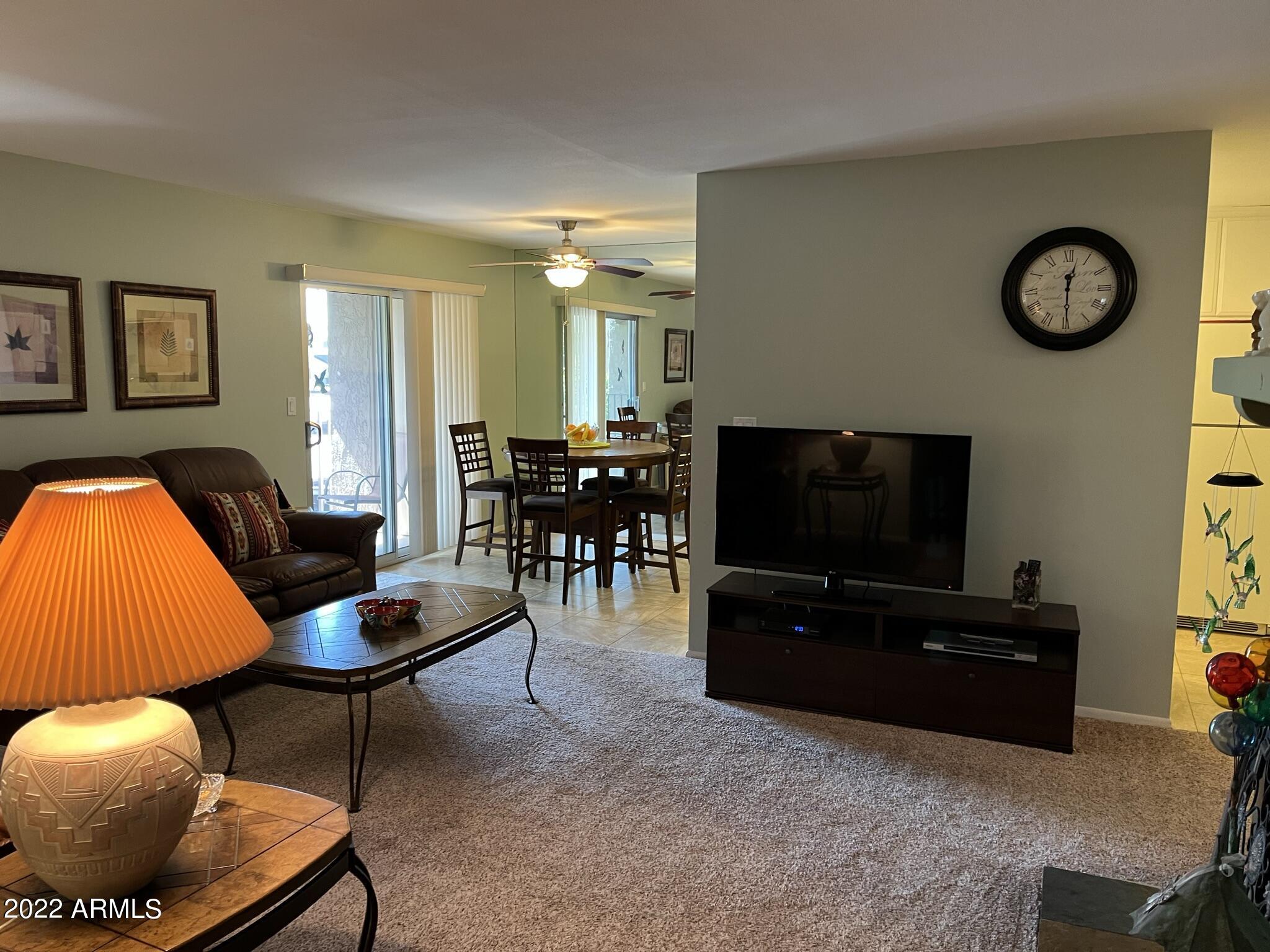 5525 East Thomas Road, Unit A11 Phoenix, AZ 85018 - Photo 11 of 22 Spacious Living Room and Dining