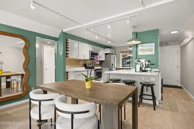 a view of a dining room with furniture