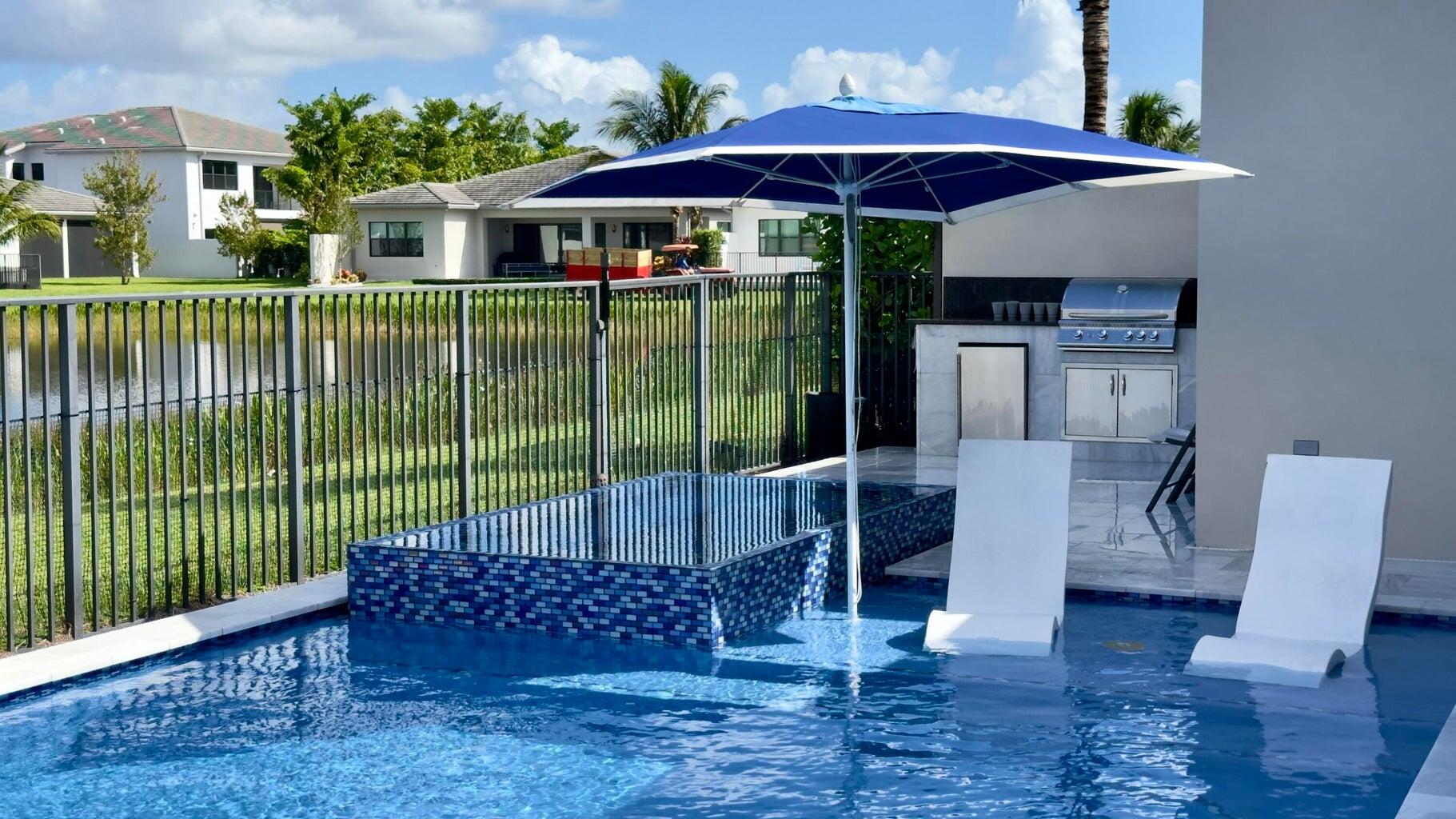 8817 New River Falls Road Boca Raton, FL 33496 - Photo 33 of 54 a porch with seating space