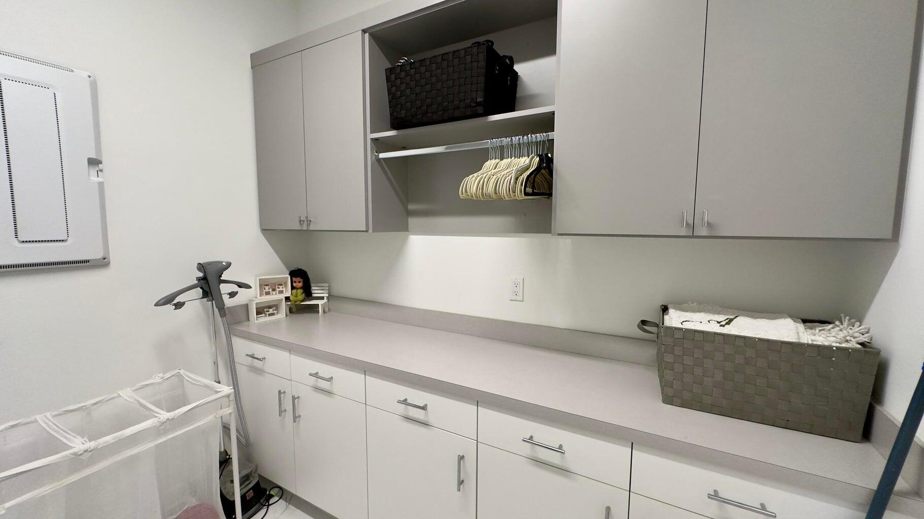 8817 New River Falls Road Boca Raton, FL 33496 - Photo 43 of 54 a kitchen with a sink and cabinets