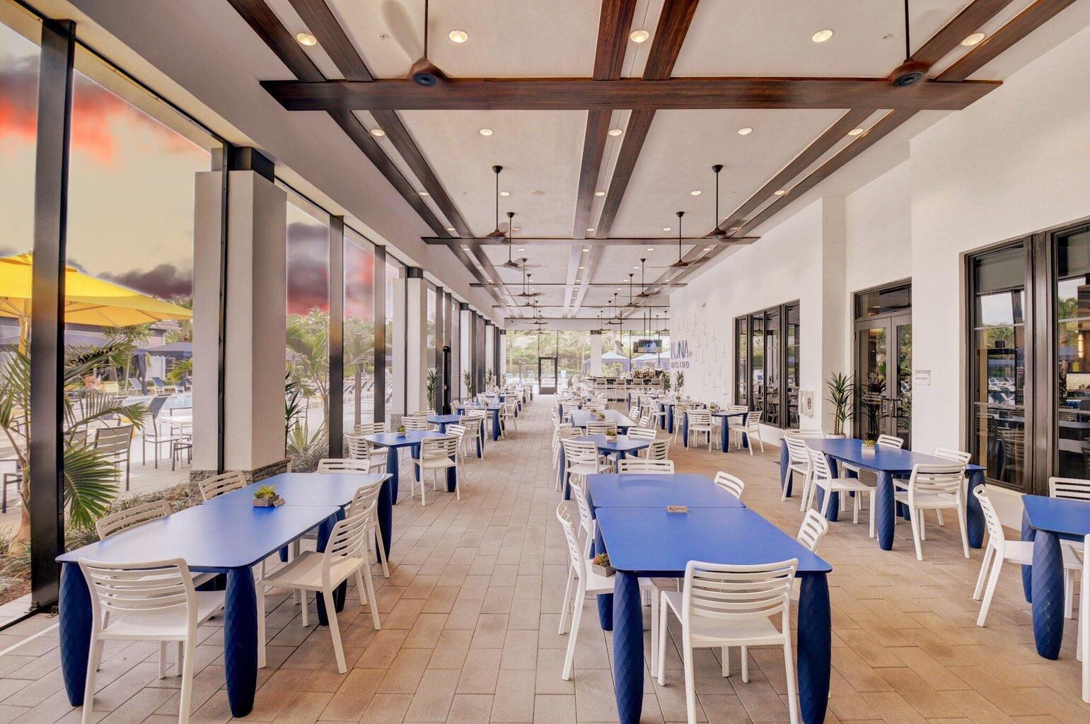 8817 New River Falls Road Boca Raton, FL 33496 - Photo 52 of 54 a outdoor space with lots of furniture and glass door