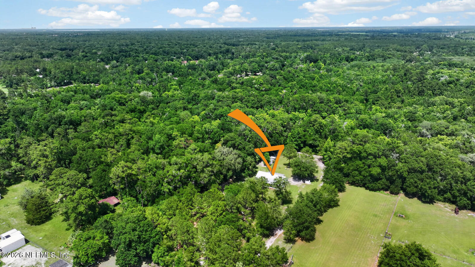 264 Peniel Church Road Palatka, FL 32177 - Photo 42 of 48 a view of a lake and green space
