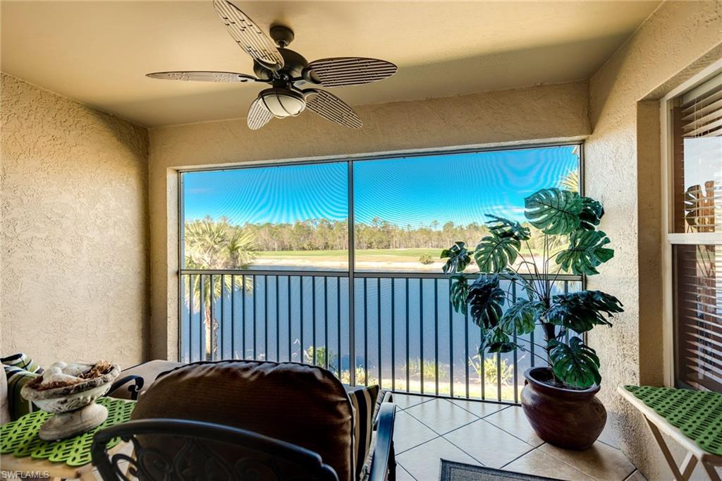 7635 Arbor Lake Court, Unit 2423 Naples, FL 34112 - Photo 2 of 35 a view of a balcony with a potted plant