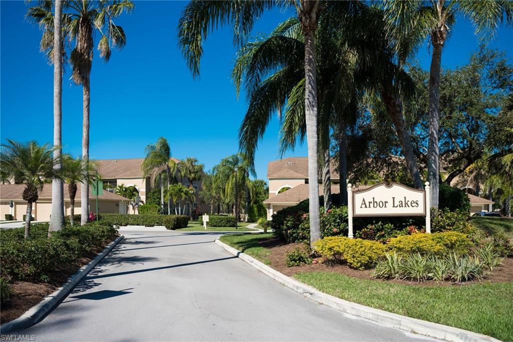 7635 Arbor Lake Court, Unit 2423 Naples, FL 34112 - Photo 21 of 35 a sign board with palm trees