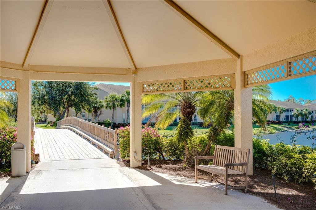 7635 Arbor Lake Court, Unit 2423 Naples, FL 34112 - Photo 28 of 35 a house view with a outdoor space